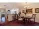 Kitchen with breakfast bar and adjacent dining area at 262 Madeira Cir, Tierra Verde, FL 33715