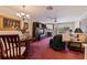 Spacious living room with fireplace and access to balcony at 262 Madeira Cir, Tierra Verde, FL 33715