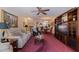Open living room with views into the kitchen and dining area at 262 Madeira Cir, Tierra Verde, FL 33715