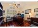 Home office with hardwood floors and built-in shelving at 262 Madeira Cir, Tierra Verde, FL 33715