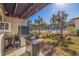Outdoor patio with grill and view of pool at 262 Madeira Cir, Tierra Verde, FL 33715