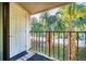 Private balcony overlooking lush tropical foliage at 3102 W Horatio St # 26, Tampa, FL 33609