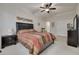 Spacious bedroom with a dresser and large bed at 3143 Brooker Creek Way, Palm Harbor, FL 34685