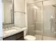Bathroom with shower, toilet and granite countertop at 4861 Tramanto Ln, Wesley Chapel, FL 33543