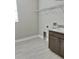 Laundry room with cabinets and overhead shelving at 4861 Tramanto Ln, Wesley Chapel, FL 33543