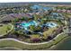 Community clubhouse, pool, and tennis courts at 5287 Rushmere Ct, Palmetto, FL 34221