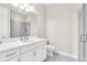 Modern bathroom with white vanity and walk-in shower at 5287 Rushmere Ct, Palmetto, FL 34221