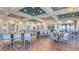 Spacious community room with multiple tables and chairs at 5287 Rushmere Ct, Palmetto, FL 34221