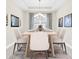 Dining room with a large table and six chairs, and natural light at 5287 Rushmere Ct, Palmetto, FL 34221