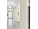 Hallway with tile floors and neutral-colored walls at 5287 Rushmere Ct, Palmetto, FL 34221