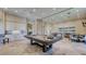 Community game room features a pool table and comfortable seating at 5287 Rushmere Ct, Palmetto, FL 34221