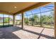 Spacious screened patio with paver flooring at 5287 Rushmere Ct, Palmetto, FL 34221