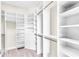 Large walk-in closet with ample shelving and hanging space at 5287 Rushmere Ct, Palmetto, FL 34221
