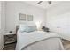 Well-lit bedroom with a comfortable bed and stylish decor at 5814 Stockport St, Riverview, FL 33578