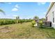 Backyard view with hammock and hot tub at 6189 Hidden Branch Dr, Apollo Beach, FL 33572