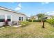 Spacious backyard with hot tub and hammock at 6189 Hidden Branch Dr, Apollo Beach, FL 33572