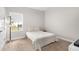 Bright bedroom with carpeted floor and neutral color palette at 6189 Hidden Branch Dr, Apollo Beach, FL 33572