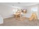 Spacious bonus room with a play area and plenty of natural light at 6189 Hidden Branch Dr, Apollo Beach, FL 33572