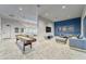 Fun game room with shuffleboard and comfortable seating at 6189 Hidden Branch Dr, Apollo Beach, FL 33572