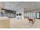 Relaxing lounge area with comfortable seating and games at 6189 Hidden Branch Dr, Apollo Beach, FL 33572