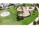 Community playground with play structures for children of all ages at 6189 Hidden Branch Dr, Apollo Beach, FL 33572