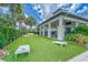 Enjoy cornhole on the community's lush lawn near the clubhouse at 6189 Hidden Branch Dr, Apollo Beach, FL 33572