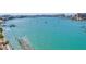 Aerial view showing waterfront property with boats at 660 Island Way # 1005, Clearwater Beach, FL 33767
