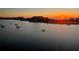 Stunning aerial view of waterfront homes at sunset at 660 Island Way # 1005, Clearwater Beach, FL 33767