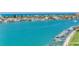 Aerial view of waterfront homes and boats on sunny day at 660 Island Way # 1005, Clearwater Beach, FL 33767
