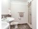 Clean bathroom with double sinks and shower at 660 Island Way # 1005, Clearwater Beach, FL 33767