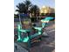 Outdoor seating at Clear Sky Beach Cafe with dolphin statue at 660 Island Way # 1005, Clearwater Beach, FL 33767