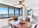Spacious dining room with water views and ample natural light at 660 Island Way # 1005, Clearwater Beach, FL 33767