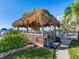 Relaxing tiki hut and outdoor seating area at 660 Island Way # 1005, Clearwater Beach, FL 33767