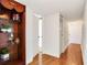 Hallway with wood floors and built-in shelving at 660 Island Way # 1005, Clearwater Beach, FL 33767