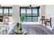 Living room with water views and area rug at 660 Island Way # 1005, Clearwater Beach, FL 33767