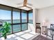 Living room with water views and ceiling fan at 660 Island Way # 1005, Clearwater Beach, FL 33767