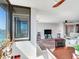Bright living room with water views and comfortable seating at 660 Island Way # 1005, Clearwater Beach, FL 33767