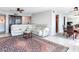 Spacious living room featuring a large sectional sofa and stunning area rug at 660 Island Way # 1005, Clearwater Beach, FL 33767