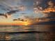 Spectacular sunset over calm ocean water at 660 Island Way # 1005, Clearwater Beach, FL 33767