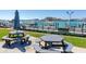Picnic tables and patio overlooking the water at 660 Island Way # 1005, Clearwater Beach, FL 33767