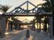 Entrance to Pier 60, walkway and palm trees at 660 Island Way # 1005, Clearwater Beach, FL 33767