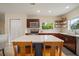 Bright kitchen featuring an island and white quartz countertops at 1013 N Habana Ave, Tampa, FL 33607