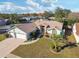 Stunning aerial view of the house and neighborhood at 10277 Rosetti Ct, Spring Hill, FL 34608