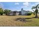 Backyard view of house and pool area at 10277 Rosetti Ct, Spring Hill, FL 34608