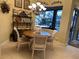 Casual breakfast nook with seating for four and pool view at 10626 Restoration Ter, Bradenton, FL 34212