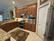 Spacious kitchen featuring granite countertops and stainless steel appliances at 10626 Restoration Ter, Bradenton, FL 34212