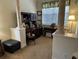 Home office with built-in cabinetry and plenty of workspace at 10626 Restoration Ter, Bradenton, FL 34212