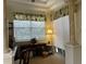 Bright and airy home office with a desk and window views at 10626 Restoration Ter, Bradenton, FL 34212