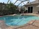 Relaxing screened pool and spa area at 10626 Restoration Ter, Bradenton, FL 34212