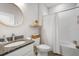 Simple bathroom with a shower/tub combo and granite countertop at 1089 Manzanar Pl, Wesley Chapel, FL 33543